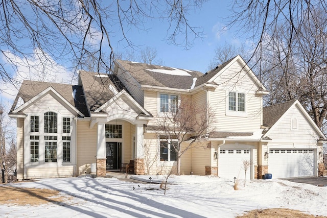 view of front of home featuring roof with shingles