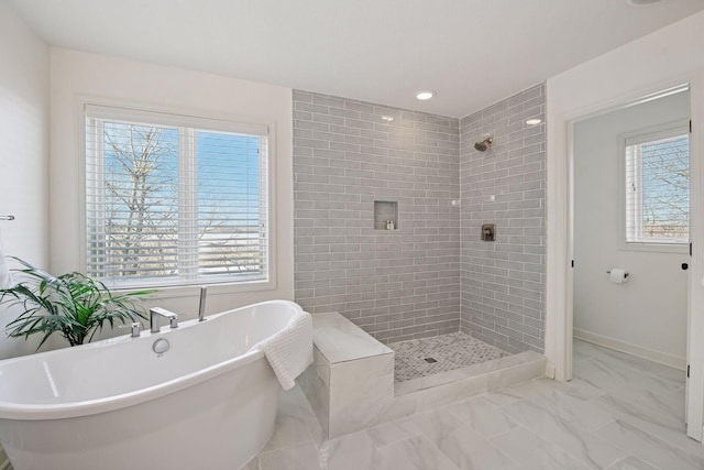 full bathroom with baseboards, recessed lighting, tiled shower, a soaking tub, and marble finish floor