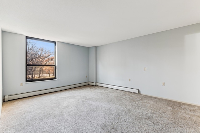 spare room with light colored carpet