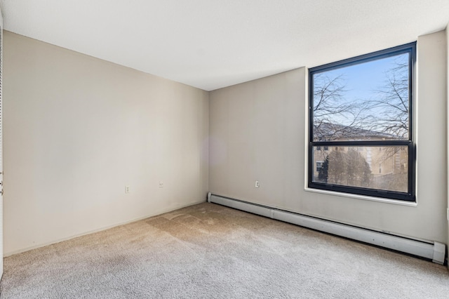 unfurnished room with carpet and baseboard heating