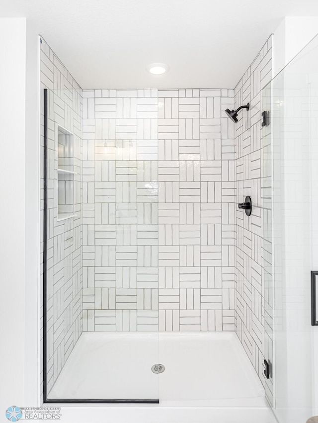 bathroom featuring walk in shower