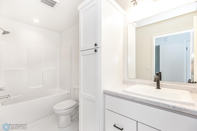 full bathroom with toilet, vanity, and tub / shower combination