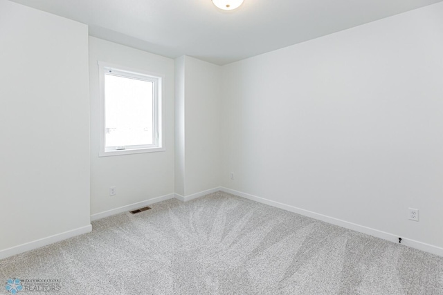 empty room featuring carpet