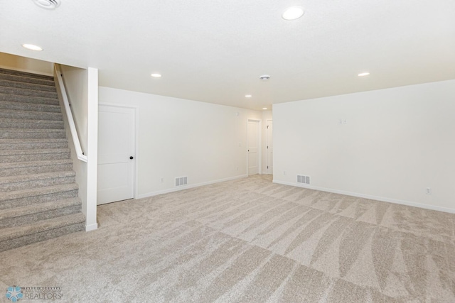 basement with light carpet