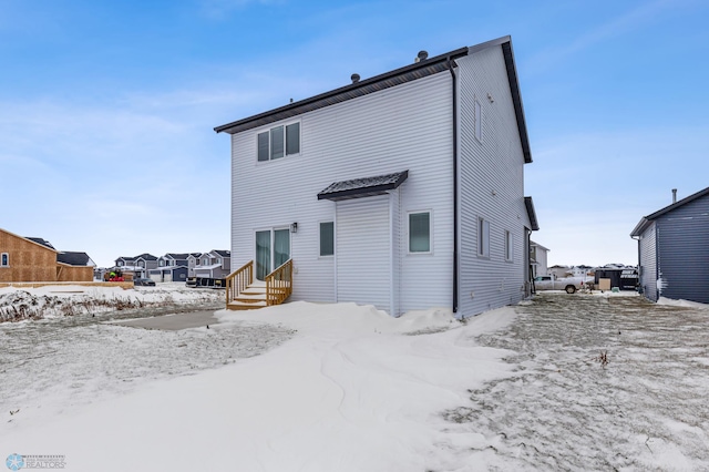 view of snow covered property