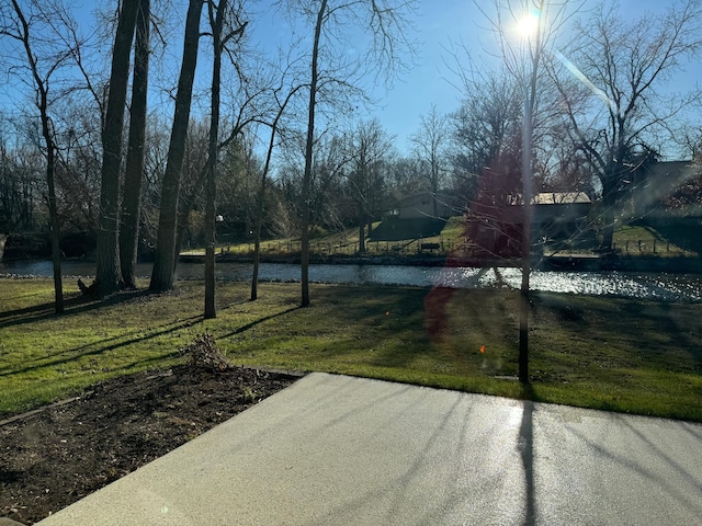 view of yard with a water view