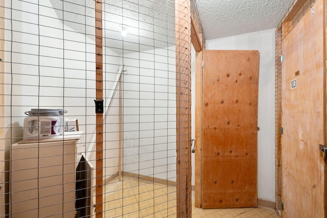 bathroom featuring a textured ceiling