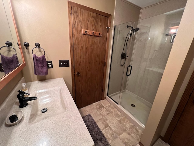 bathroom featuring vanity and walk in shower