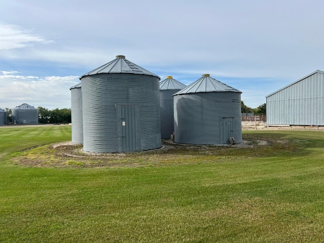 view of outdoor structure with a yard