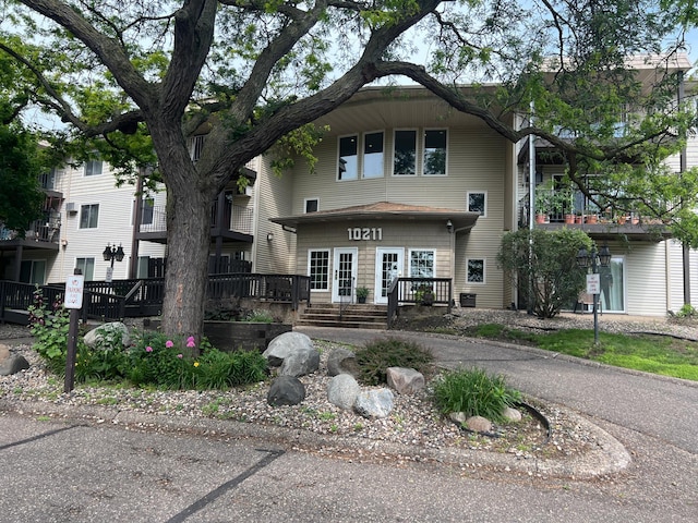 view of front of home with cooling unit