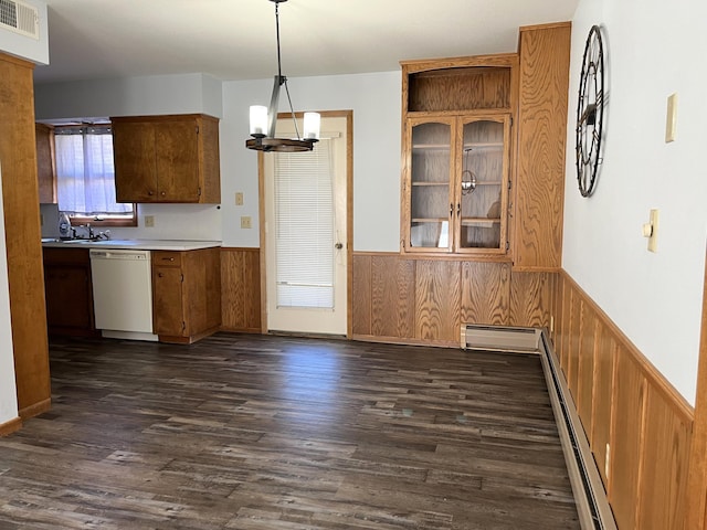 kitchen with decorative light fixtures, white dishwasher, dark wood-type flooring, and a notable chandelier