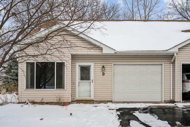 view of front of home with a garage