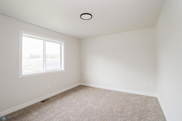 view of carpeted spare room