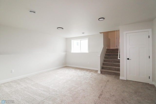 spare room featuring carpet flooring