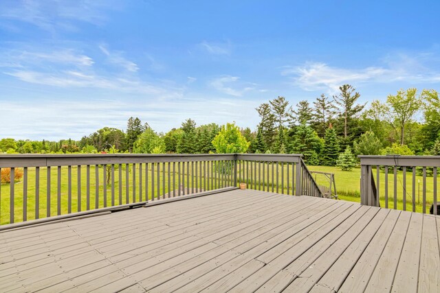 6972 360th St, North Branch, MN 55056 - wooden terrace featuring a lawn