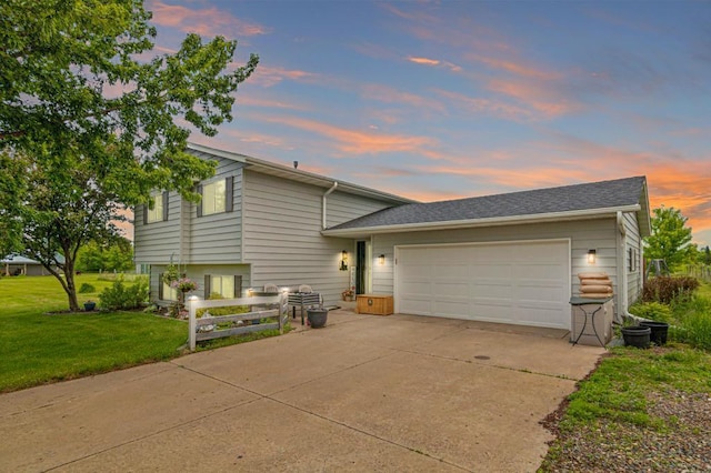 6972 360th St, North Branch, MN 55056 - tri-level home featuring a yard, concrete driveway, and a garage