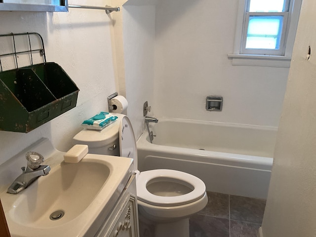 full bathroom featuring tile patterned floors, vanity, toilet, and shower / tub combination