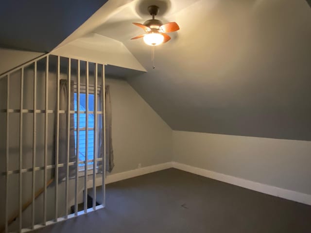 additional living space featuring ceiling fan