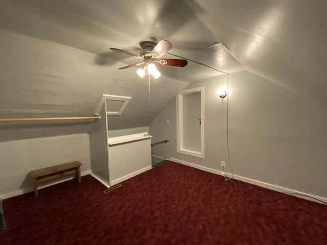 bonus room with ceiling fan, carpet floors, and vaulted ceiling