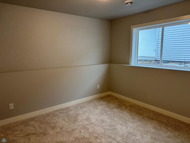 view of carpeted spare room