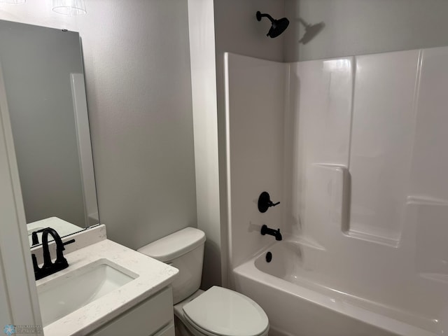 full bathroom featuring vanity, shower / bath combination, and toilet