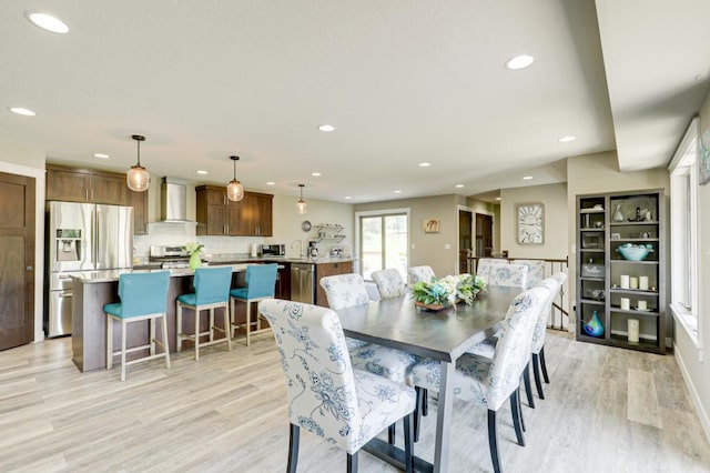 dining space featuring light hardwood / wood-style flooring