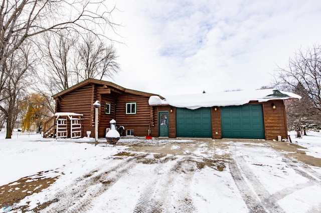 log cabin with a garage