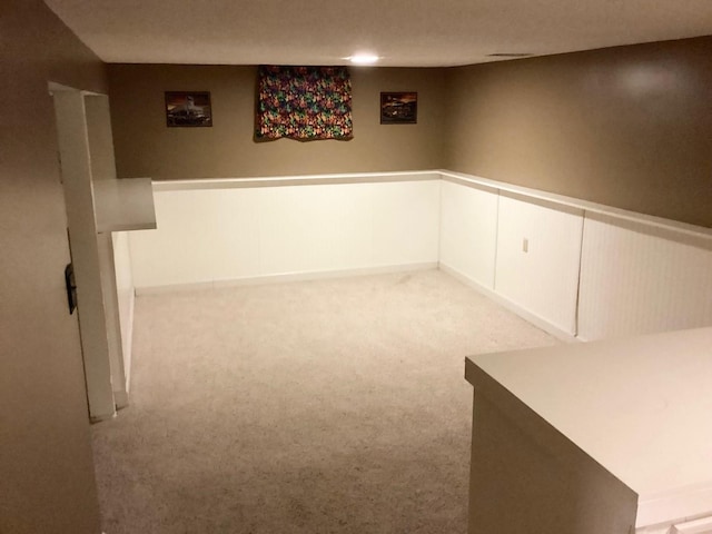 basement with light carpet