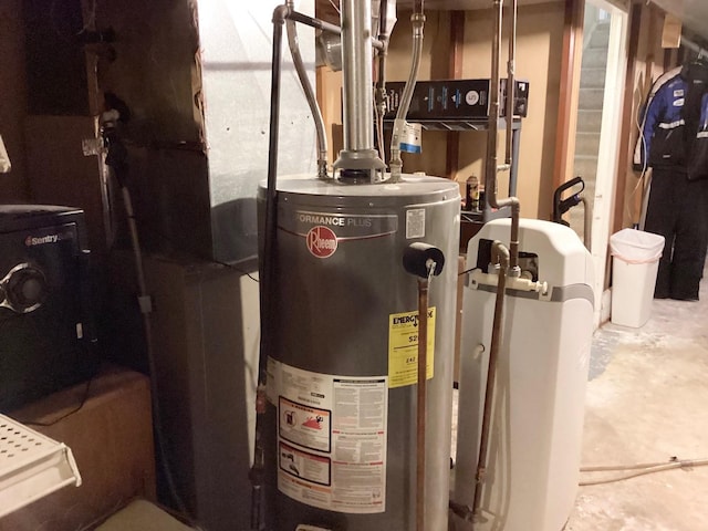 utility room featuring gas water heater