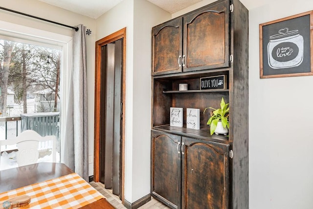 interior space featuring dark brown cabinets