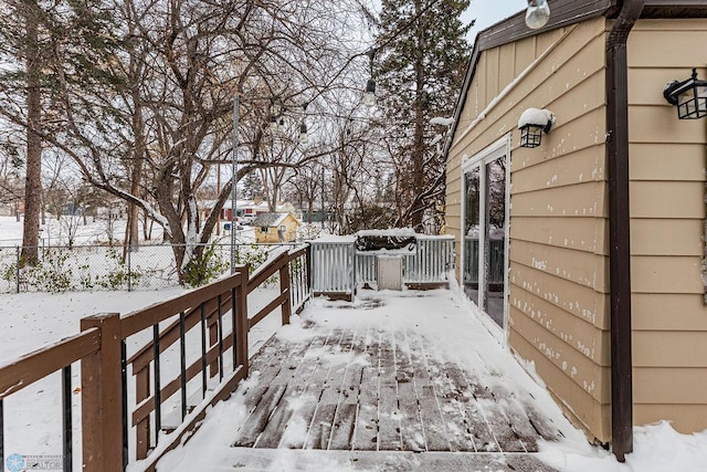 view of snow covered deck