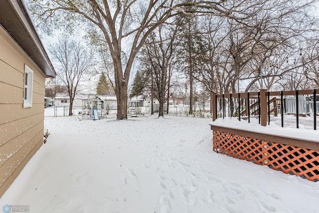 view of yard covered in snow