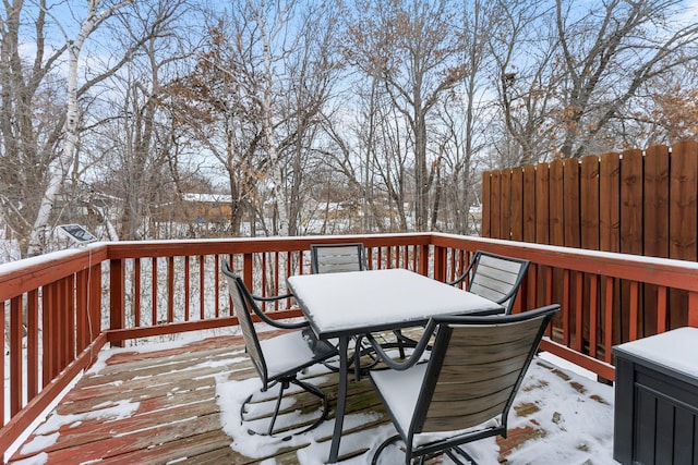 view of snow covered deck