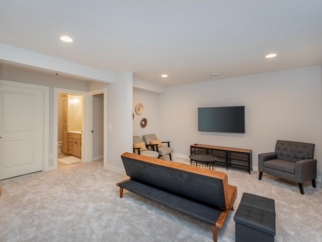 living room featuring light carpet