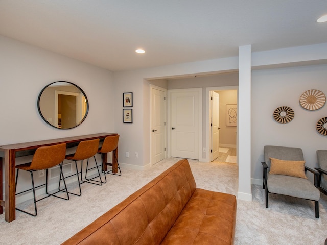 living room featuring light colored carpet