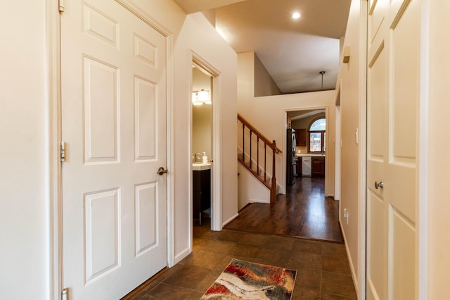 hallway featuring dark hardwood / wood-style floors