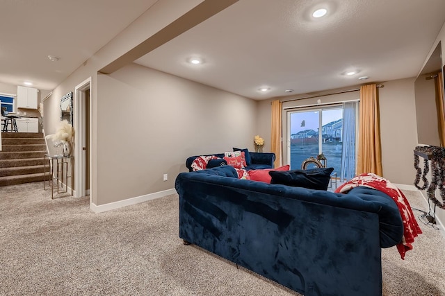 living room featuring light colored carpet