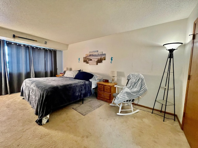 carpeted bedroom with a textured ceiling