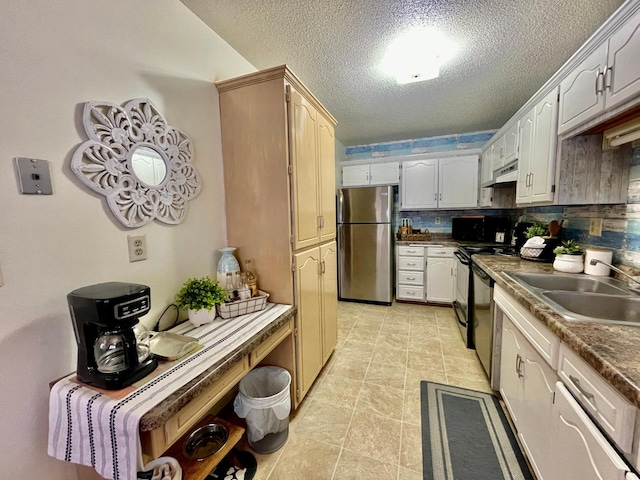 kitchen with backsplash, a textured ceiling, sink, black appliances, and white cabinetry