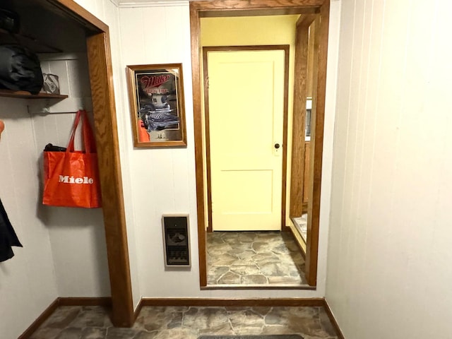 hallway with wooden walls