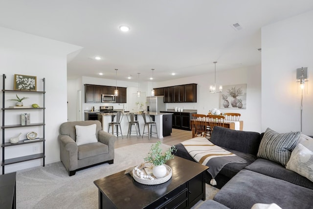 living room with a chandelier