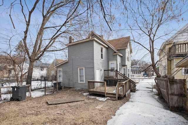 view of snow covered house