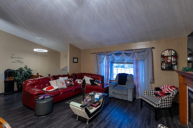 1215 18th St N, Moorhead, MN 56560 - living area with vaulted ceiling, wood finished floors, a textured ceiling, and a fireplace