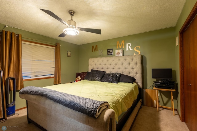 1215 18th St N, Moorhead, MN 56560 - carpeted bedroom with ceiling fan and a textured ceiling