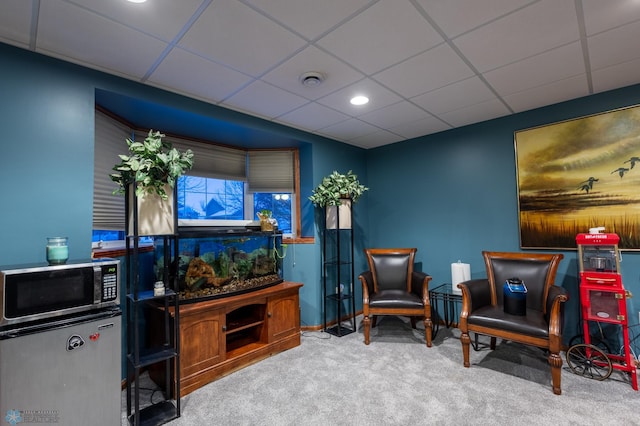 1215 18th St N, Moorhead, MN 56560 - sitting room with carpet floors, recessed lighting, a drop ceiling, and baseboards