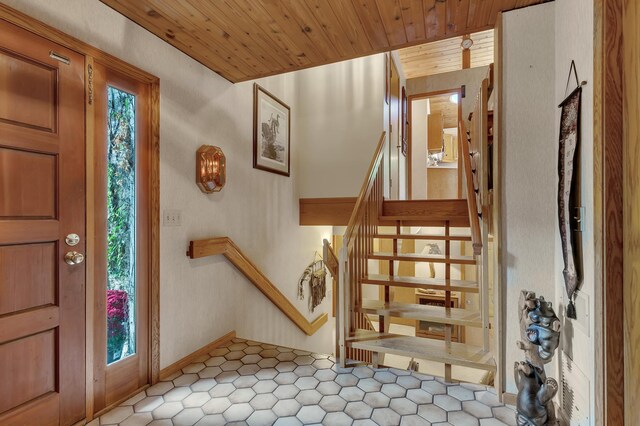 foyer featuring wooden ceiling