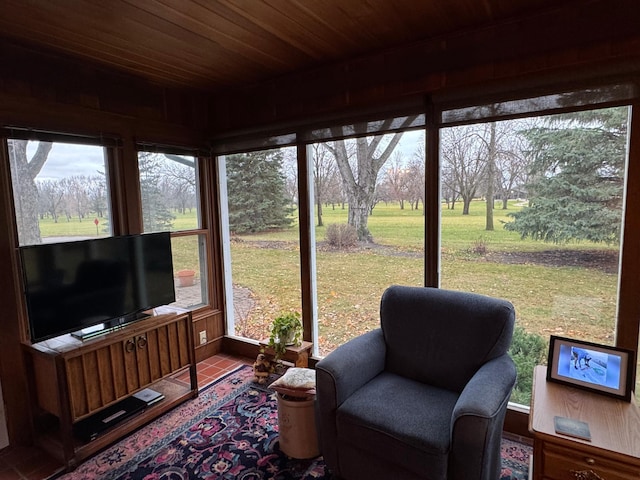 sunroom featuring wood ceiling