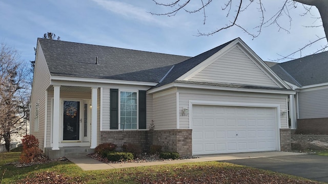 view of front of property featuring a garage