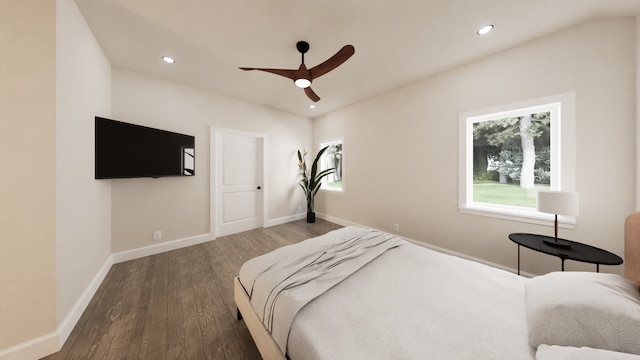 bedroom with ceiling fan and dark hardwood / wood-style floors