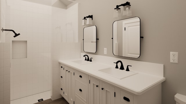 bathroom with vanity and hardwood / wood-style flooring